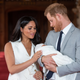 Prince Harry, Duke of Sussex and Meghan, Duchess of Sussex, pose with their newborn son Archie Harrison Mountbatten-Windsor during a photocall in St George’s Hall at Windsor Castle on May 8, 2019 in Windsor, England. The Duchess of Sussex gave birth at 05:26 on Monday, May 6, 2019.